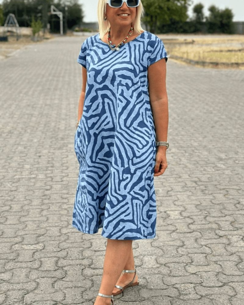 Melia | Vestido de verano con escote redondo y hermosa estampado