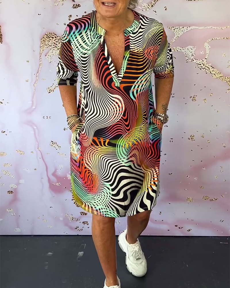 Ria™ | Vestido colorido con escote en V