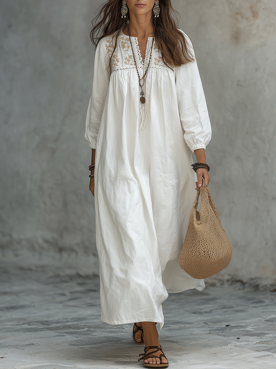 Vestido Maxi Blanco Bohemio con Bordado Floral y Mangas de Globo