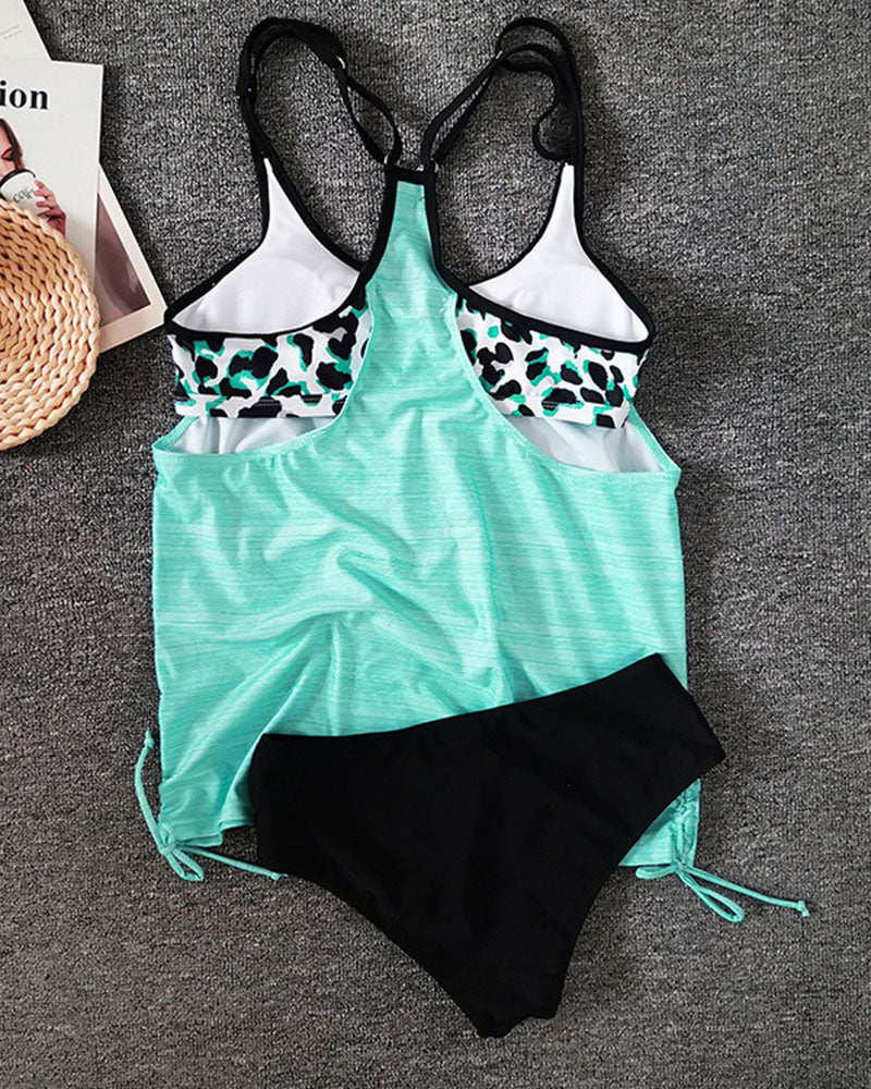 Augustus - Tankini liso con estampado de pantera