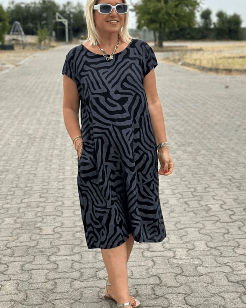 Melia | Vestido de verano con escote redondo y hermosa estampado