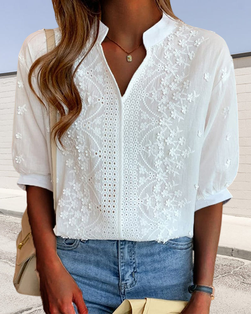 Blusa con escote en V y mangas abullonadas con decoración de encaje
