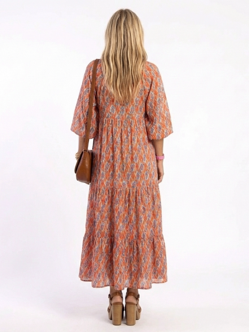 Amara | Vestido Midi Acampanado de Cuello en V con Estampado Geométrico