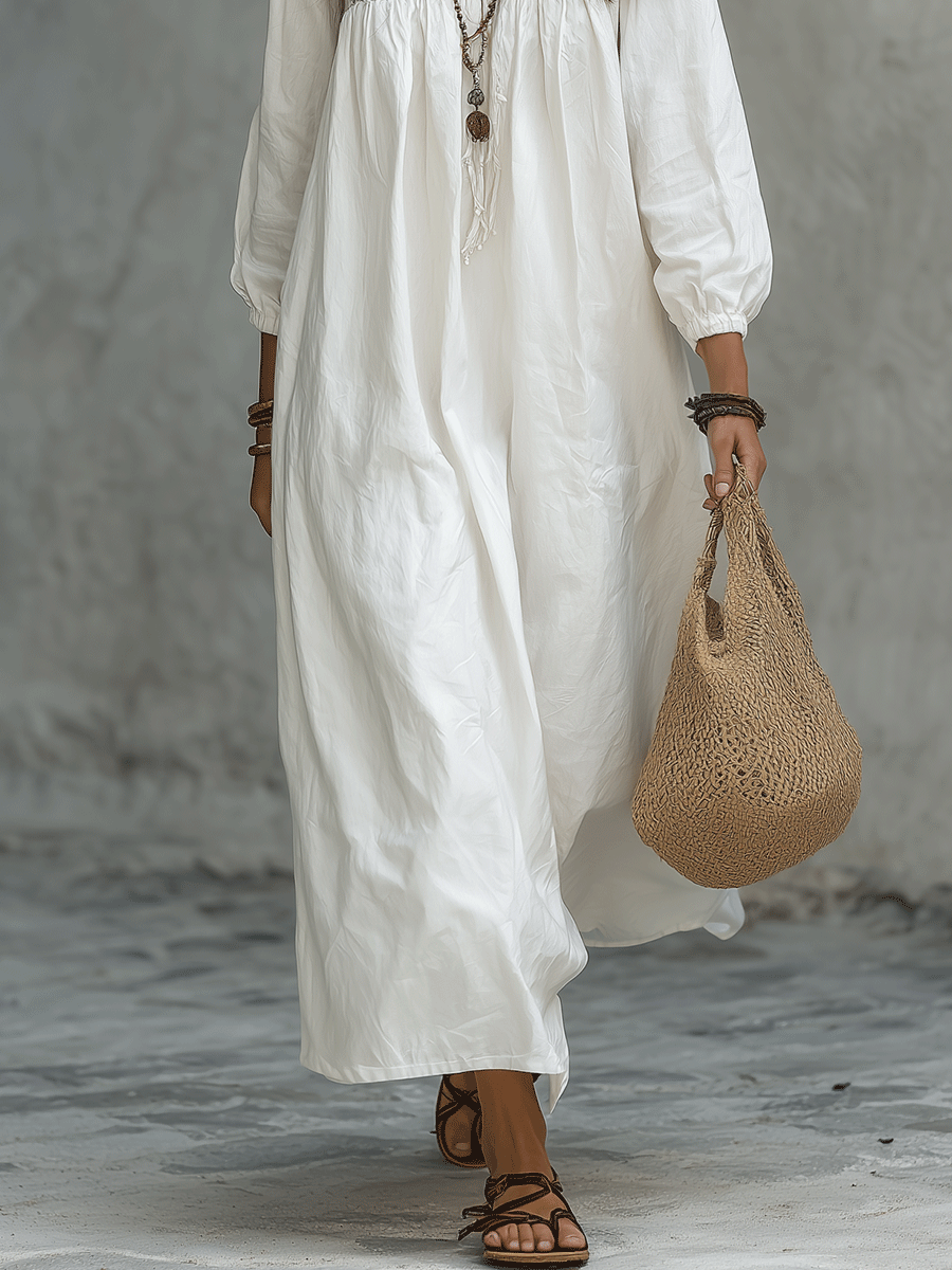 Vestido Maxi Blanco Bohemio con Bordado Floral y Mangas de Globo