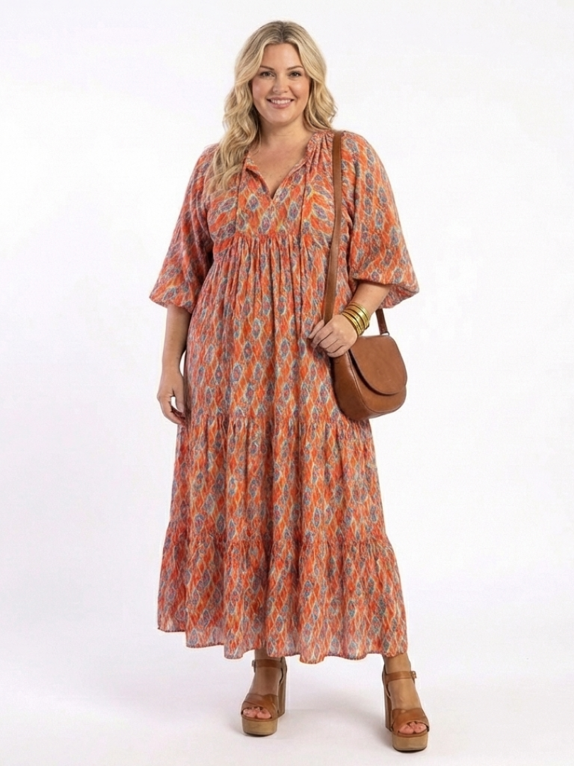 Amara | Vestido Midi Acampanado de Cuello en V con Estampado Geométrico