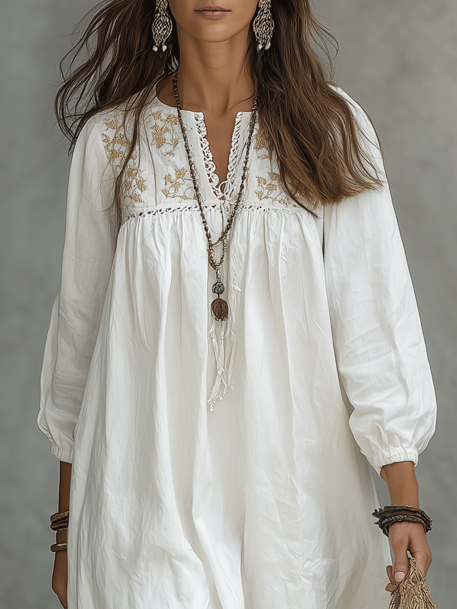 Vestido Maxi Blanco Bohemio con Bordado Floral y Mangas de Globo